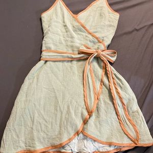 Saints + Secrets green and tan mini wrap dress